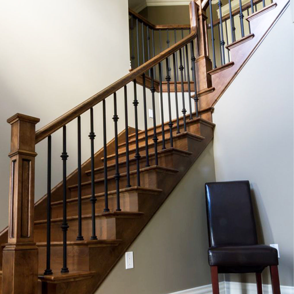 modern contemporary staircase with mega double knuckle wrought iron baluster